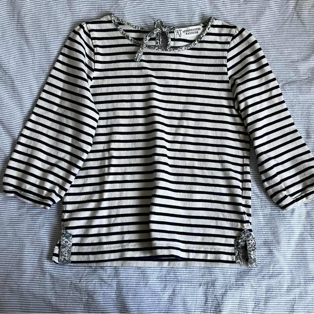 Striped top with floral detail